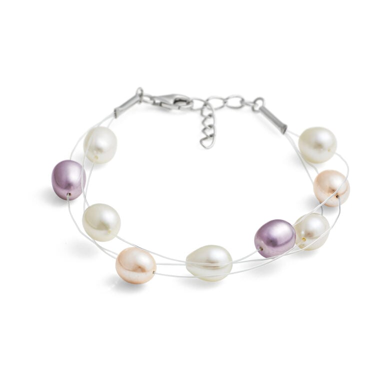 Multi Natural Oval Freshwater Pearl Bracelet on a Double Row Clear Nylon Thread.