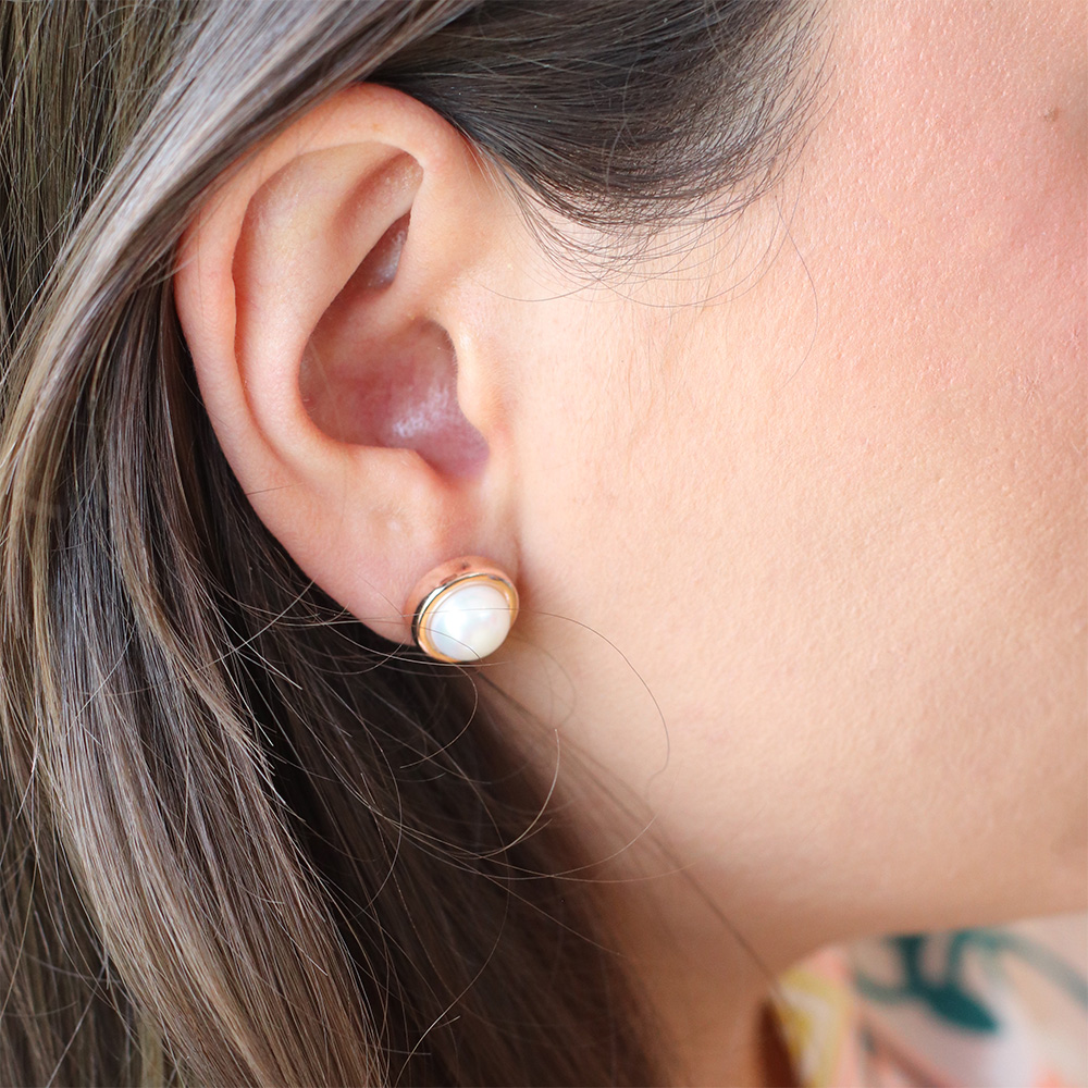 model wearing large Alice freshwater pearl stud earring