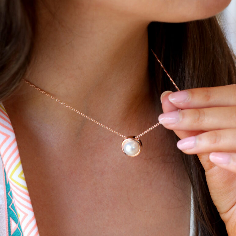 Model wearing Alice Rose Gold Single Pearl Pendant