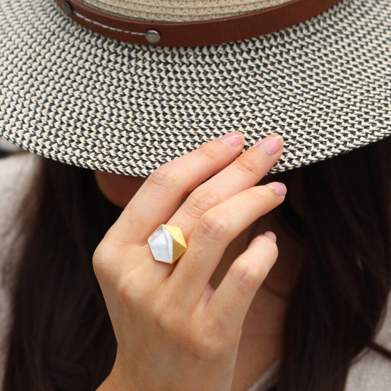 Lifestyle model wearing Kyra gold adjustable ring