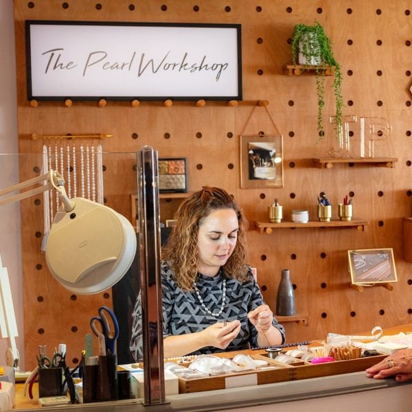 photo of jersey pearl woman in pearl workshop designing jewellery